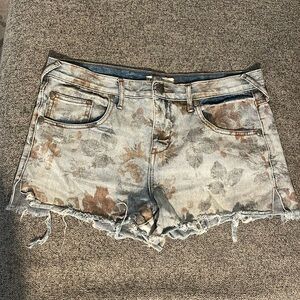 Free People vintage Jean shorts with faded pattern